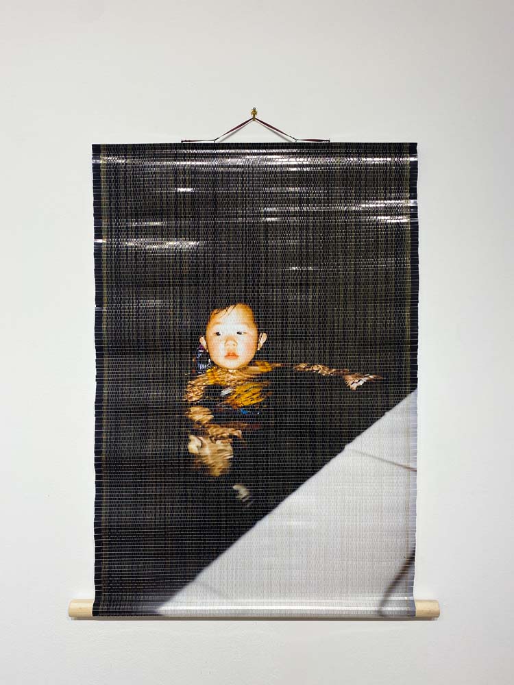 Tong Zhou Lafrance Untitled Labour: Golden Pearl 1998, 2022 Photo paper woven with sewing metallic threads, supported with wooden dowels 20” x 30”.